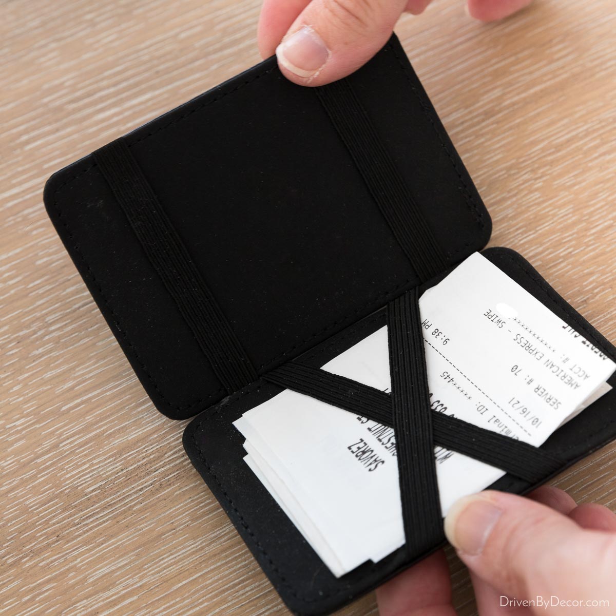 Receipts held under elastics in a "magic wallet"