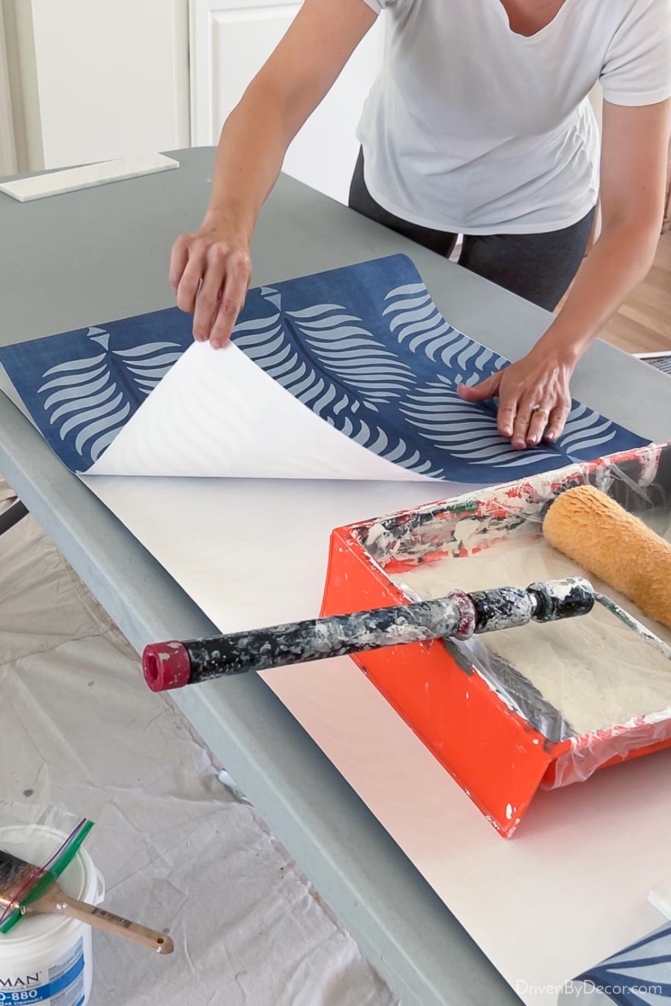 Folding over the top half of the wallpaper strip