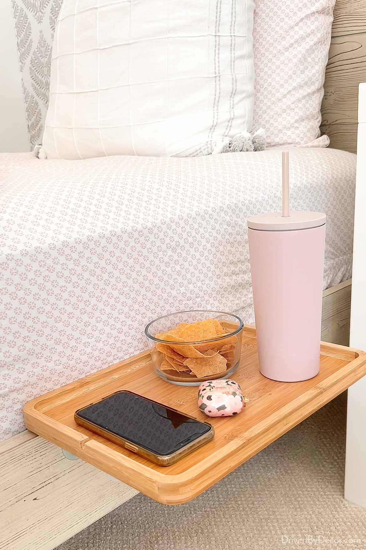 A bed shelf that attaches to the bed with two screw-tight clamps!