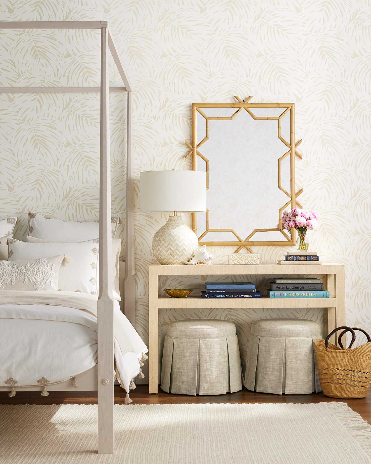 A pair of skirted stools tucked under a console table