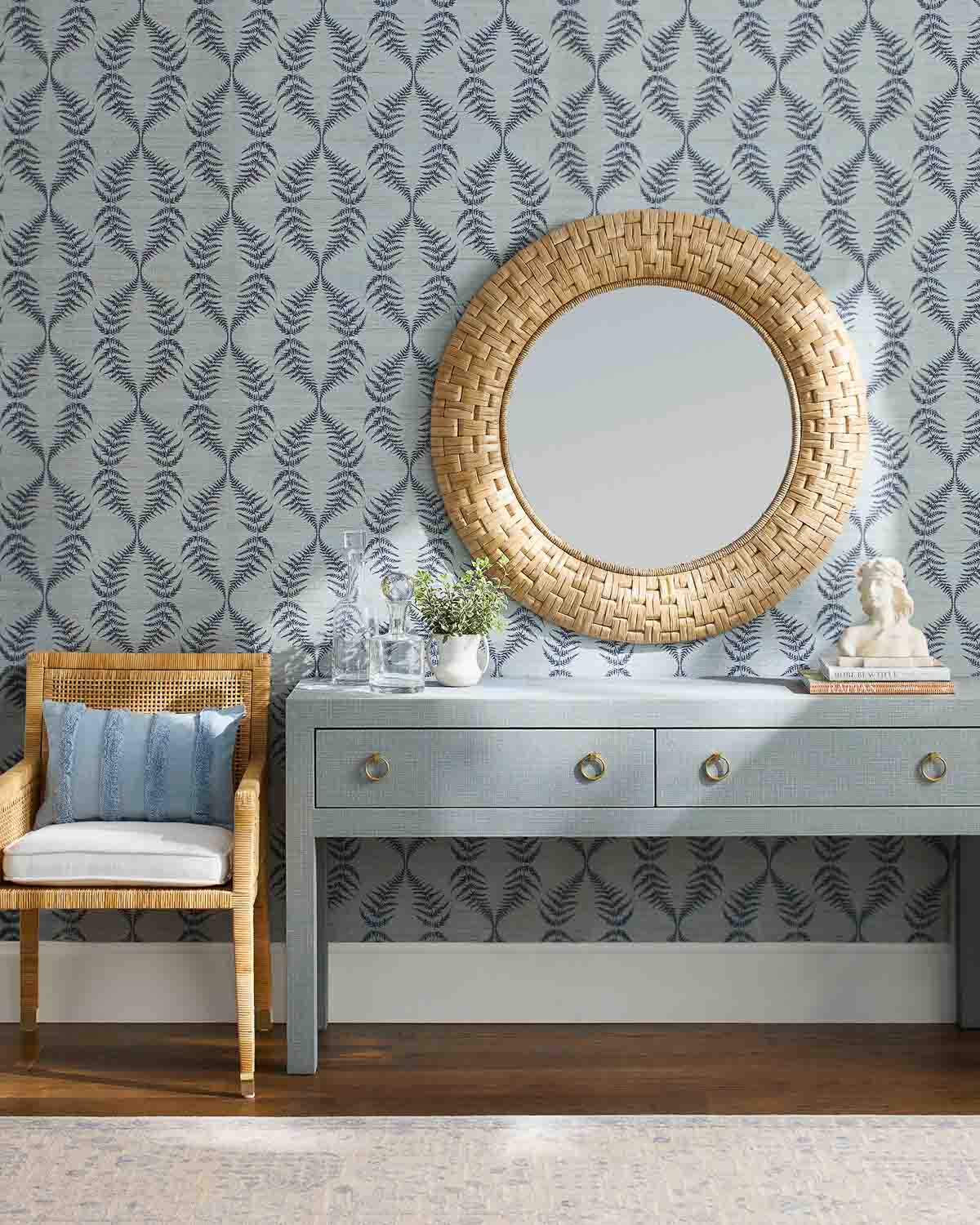 Circular mirror over console table