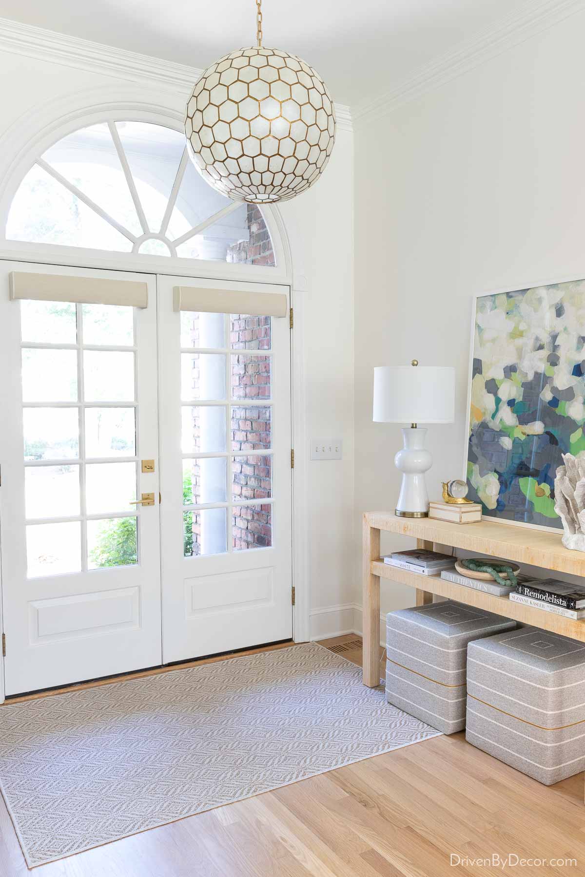 Rug over hardwood floors in the entryway