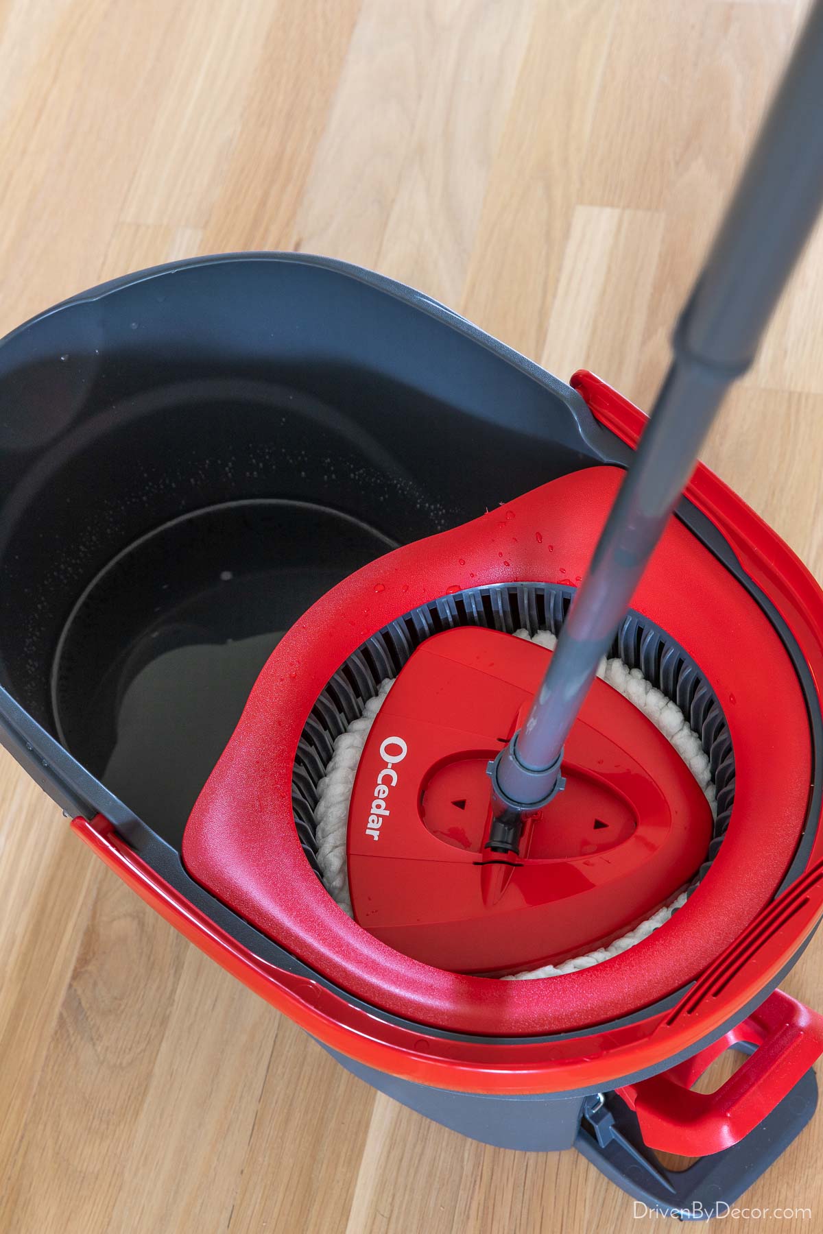 The spin mop system for cleaning hardwood floors