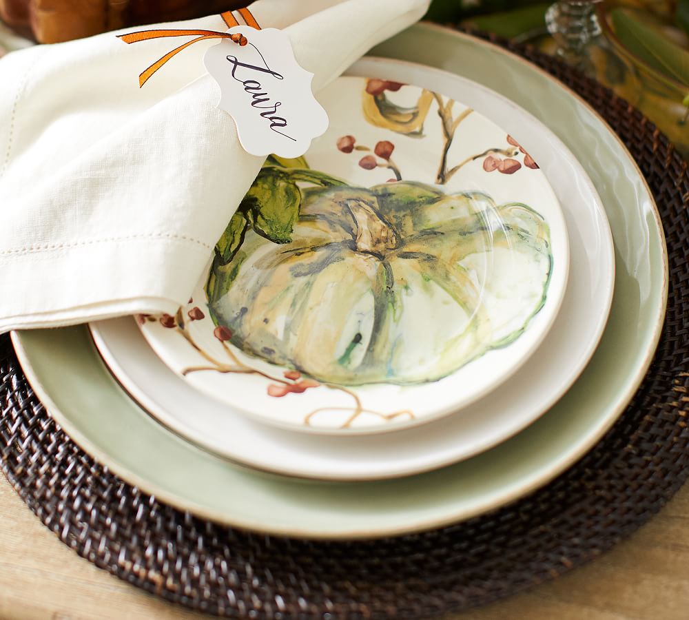 Pumpkin salad plates mixed with solid dinnerware for a fall table