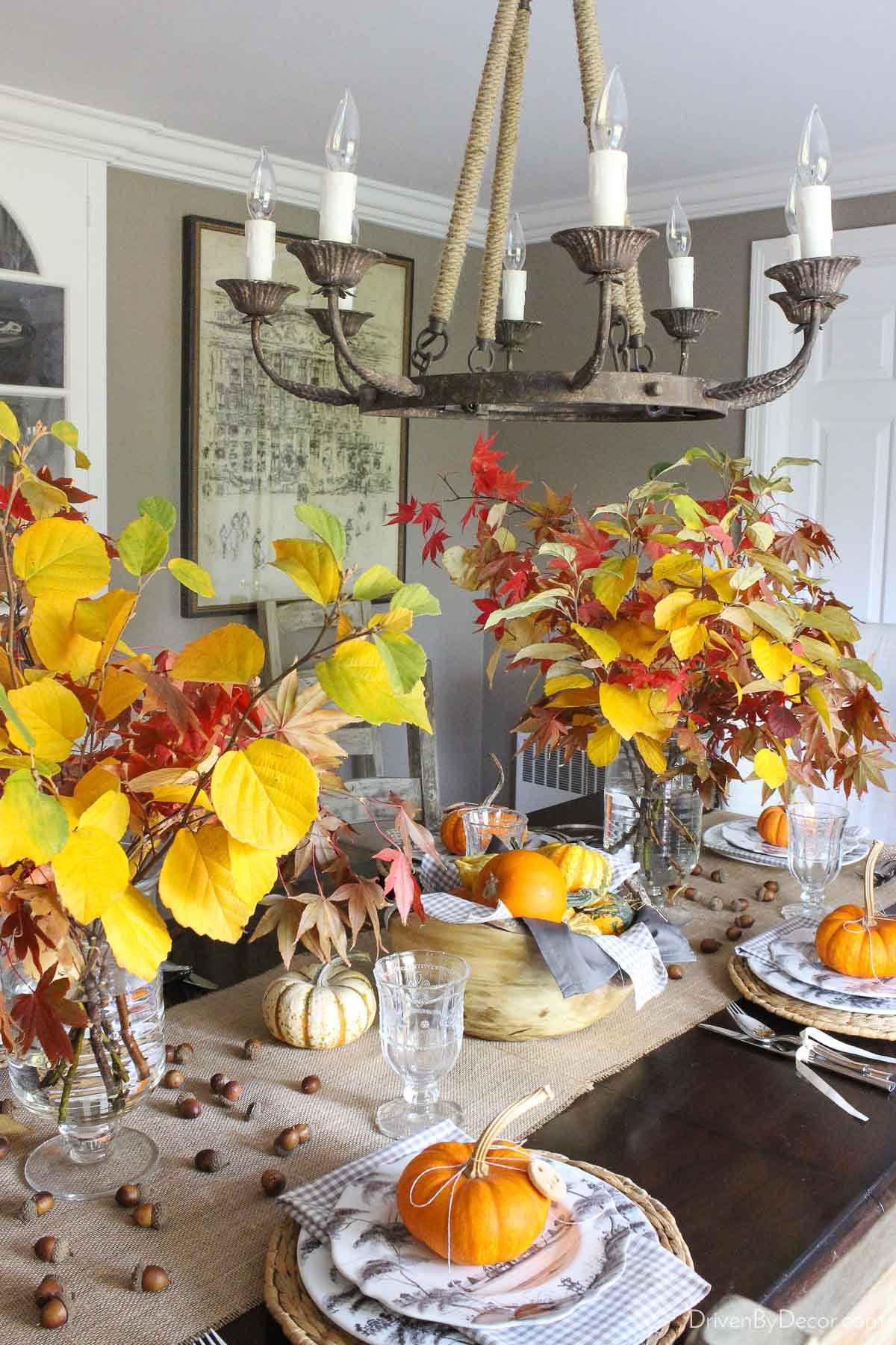 Fall table with vases of leafy branches