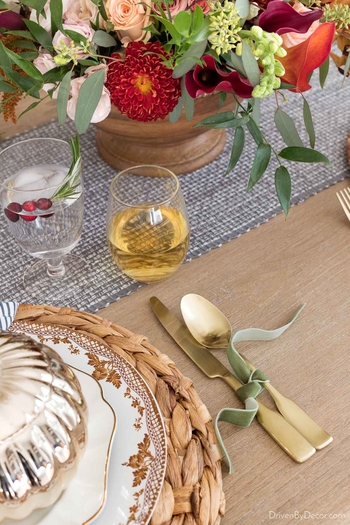 Velvet ribbon tied silverware for a fall dinner