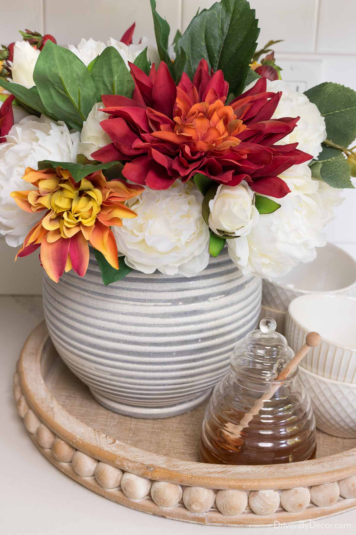 Faux flowers as fall decor