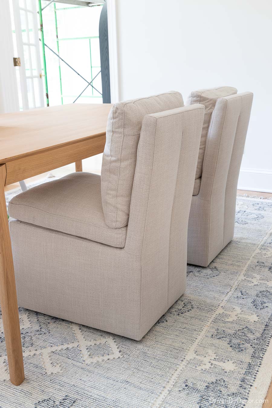 Upholstered dining room side chairs on casters