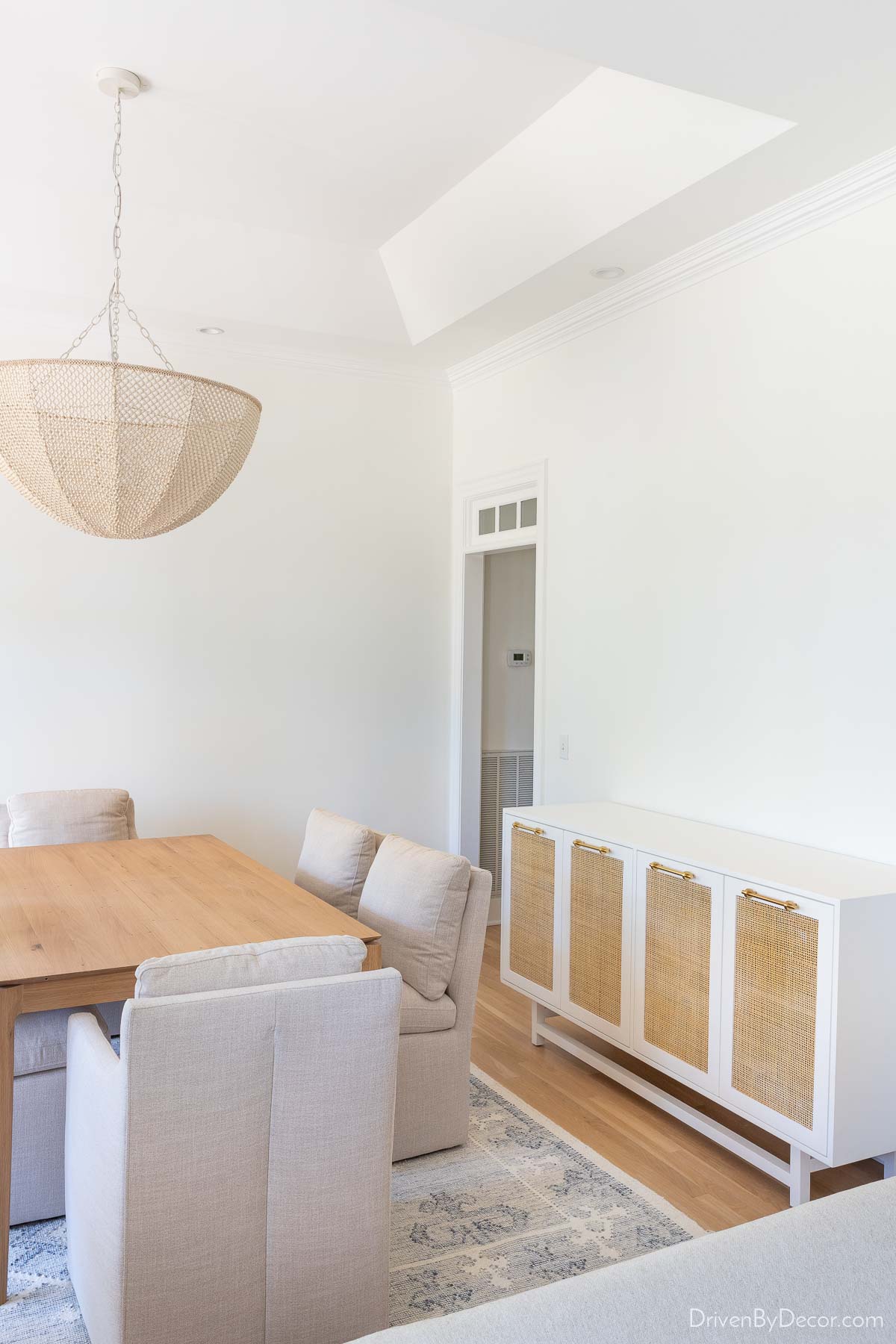 Our white cane dining room sideboard