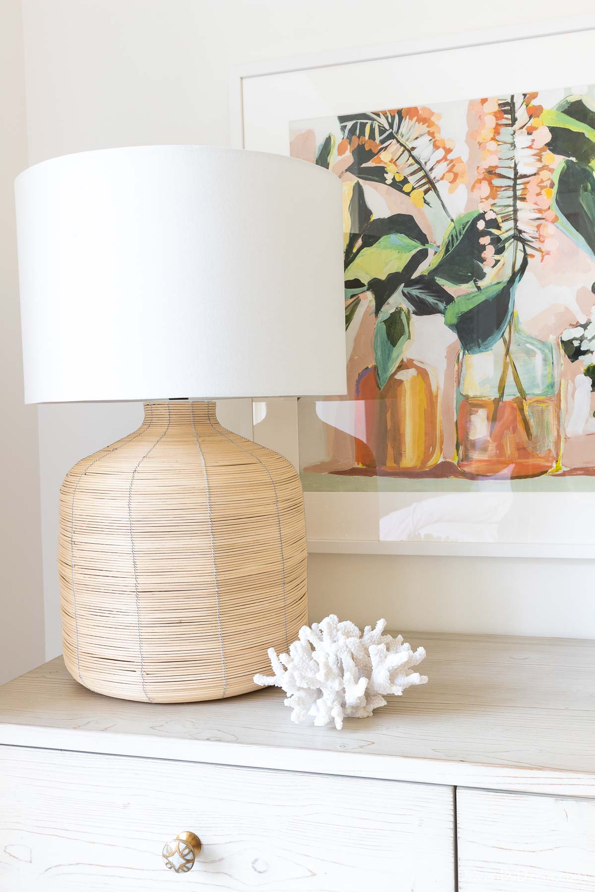 Oversized rattan lamp on our bedroom dresser