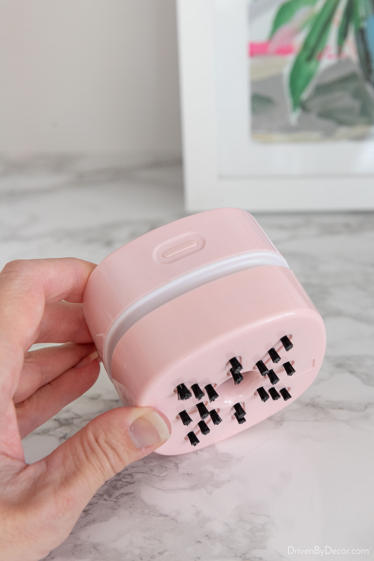 Mini vacuum that's perfect for cleaning crumbs, dust, & debris on desks & dining tables