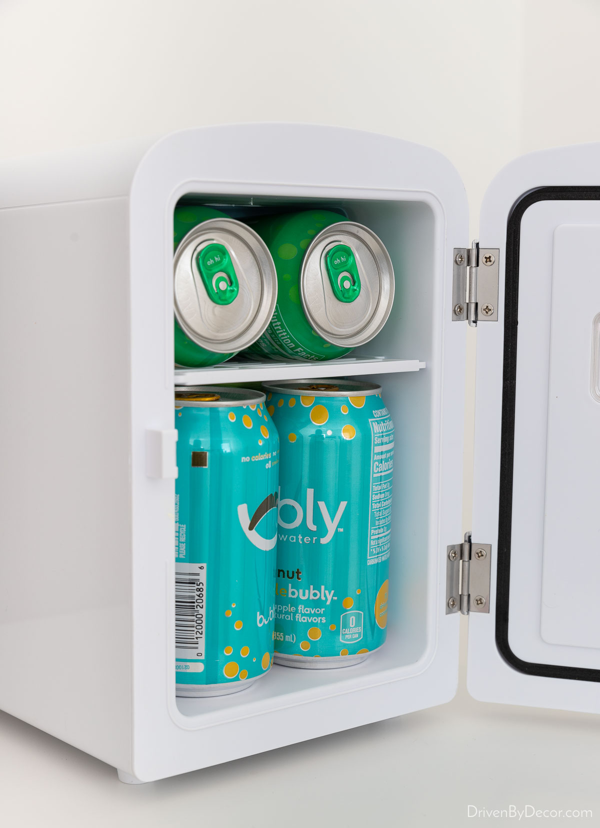 Guest Bedroom Ideas For Creating a Welcoming Retreat! Mini fridge holding 6 cans