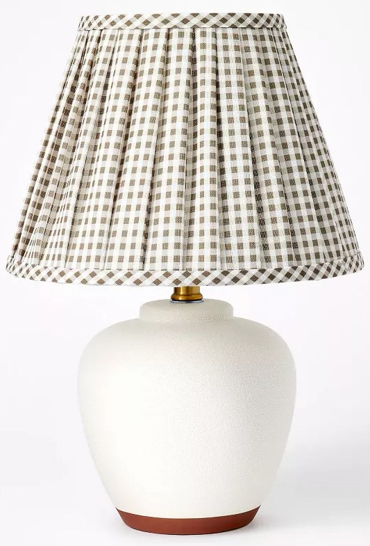 White lamp with plaid pleated shade