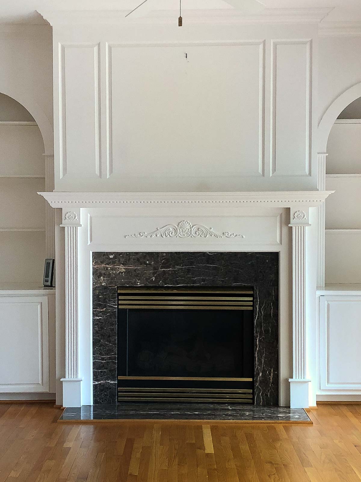Our fireplace surround and mantel before renovating