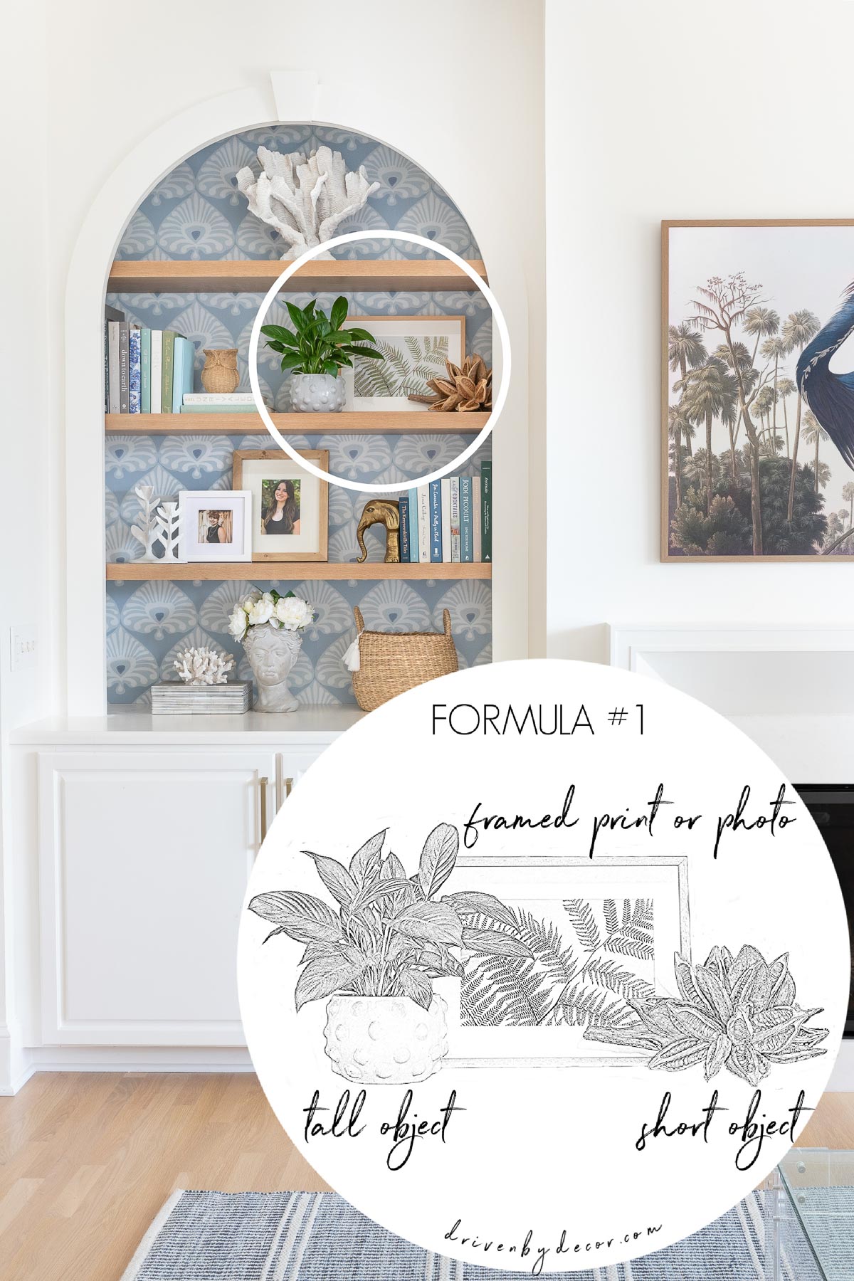 A plant, framed print, and small decorative object grouped together to decorate a shelf