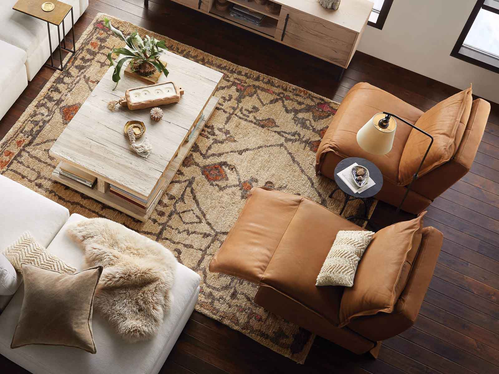 Two stylish leather recliners in a living room
