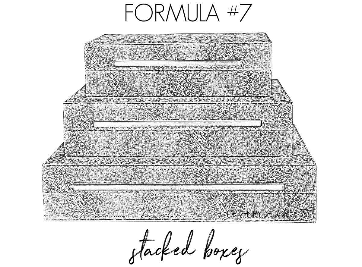 Formula for how to decorate a bookshelf - stacked boxes