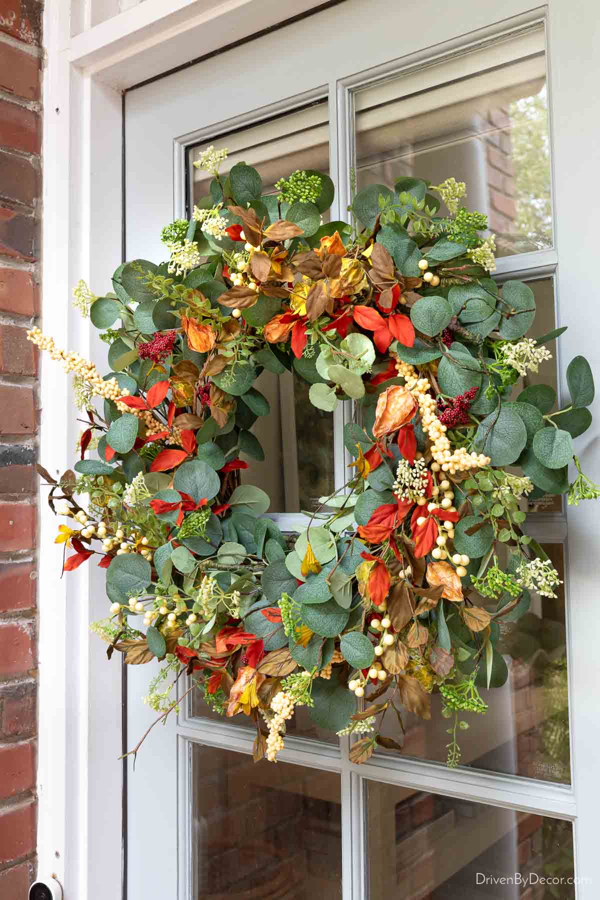Colorful fall wreath and front door
