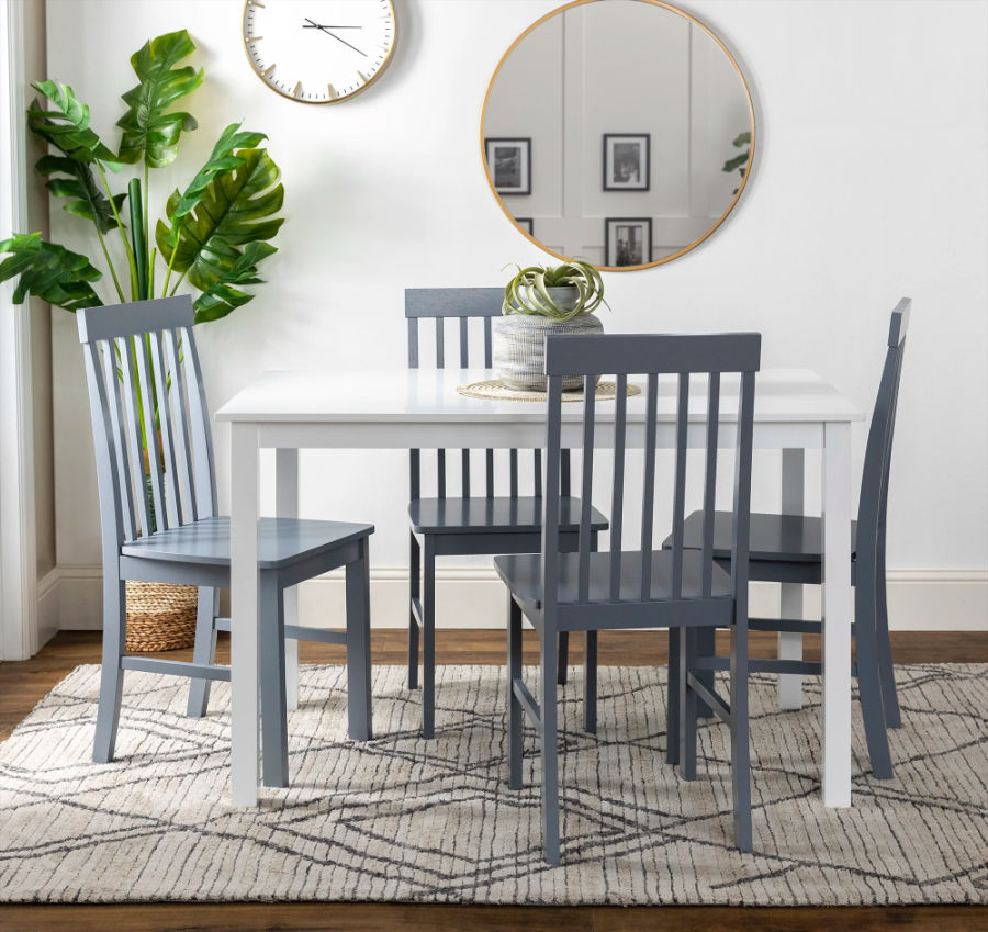 White dining table plus four gray chairs