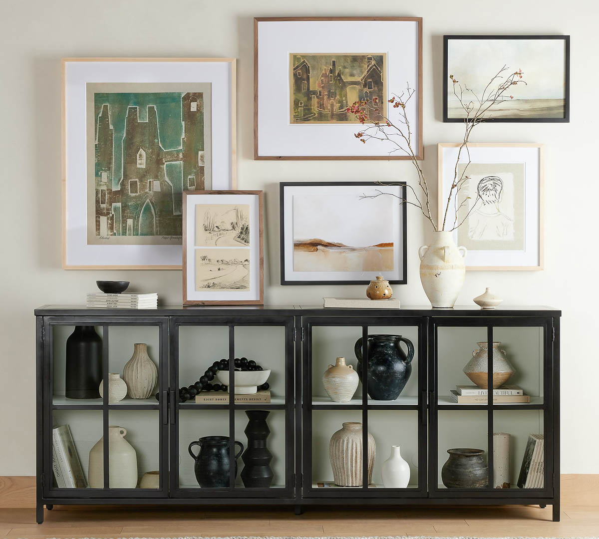 Gallery wall layout over entryway console