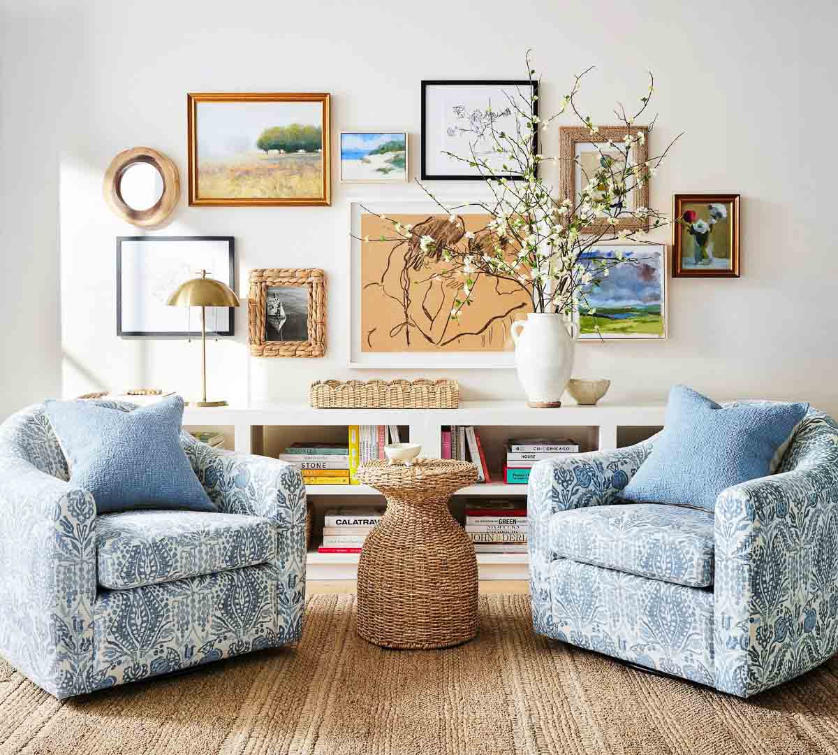 Gallery wall layout over a living room console