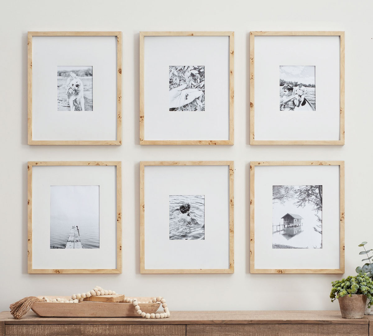 Set of 6 same sized frames hung in a classic grid as a simple gallery wall layout