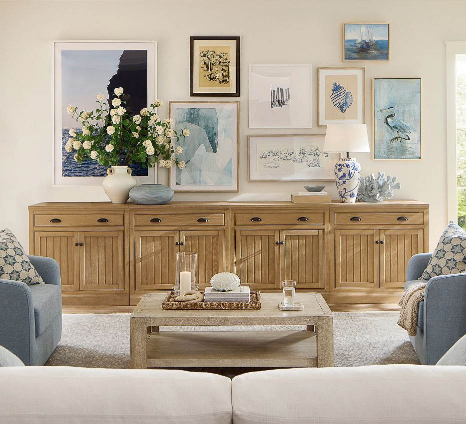 Eclectic gallery wall over long console