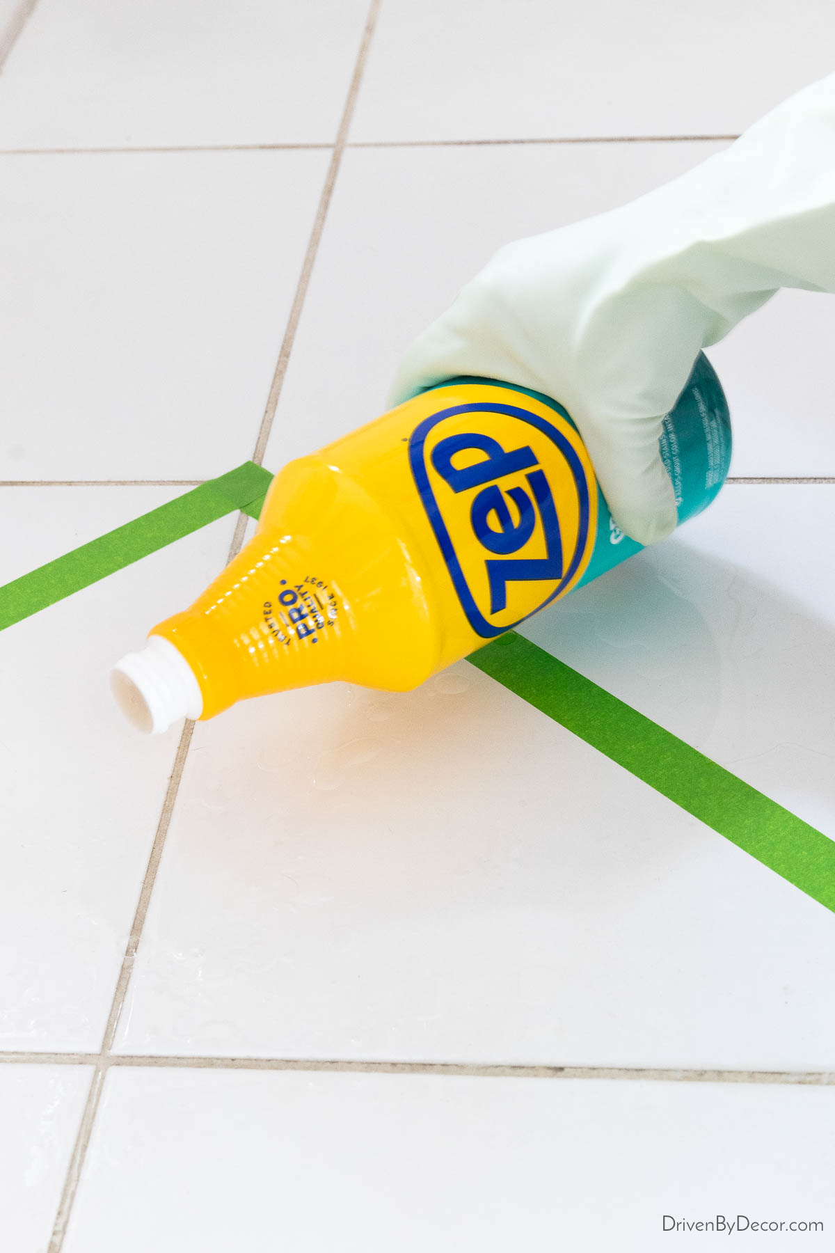 Pouring Zep grout cleaner onto grout
