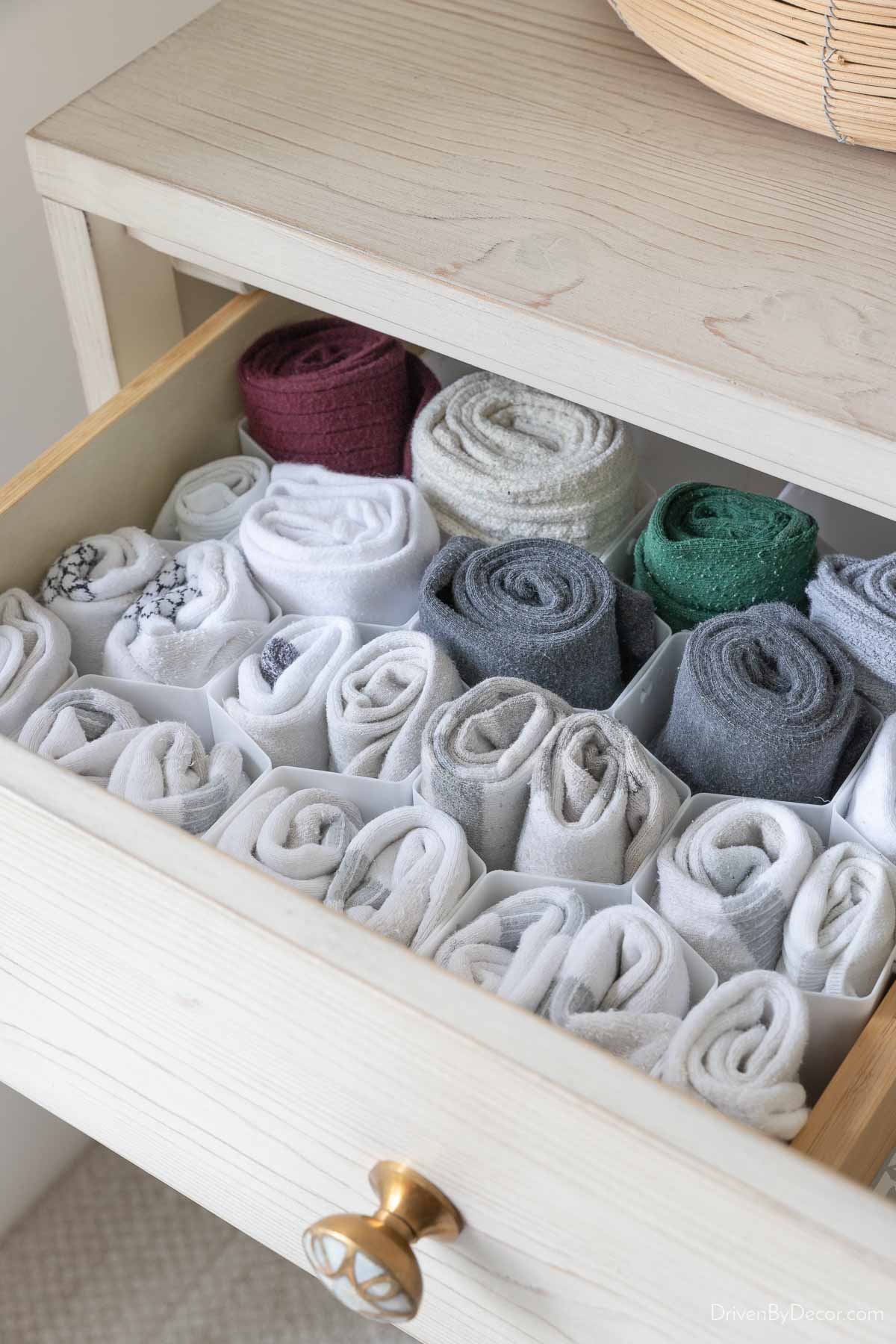 Socks in honeycomb dividers in drawer