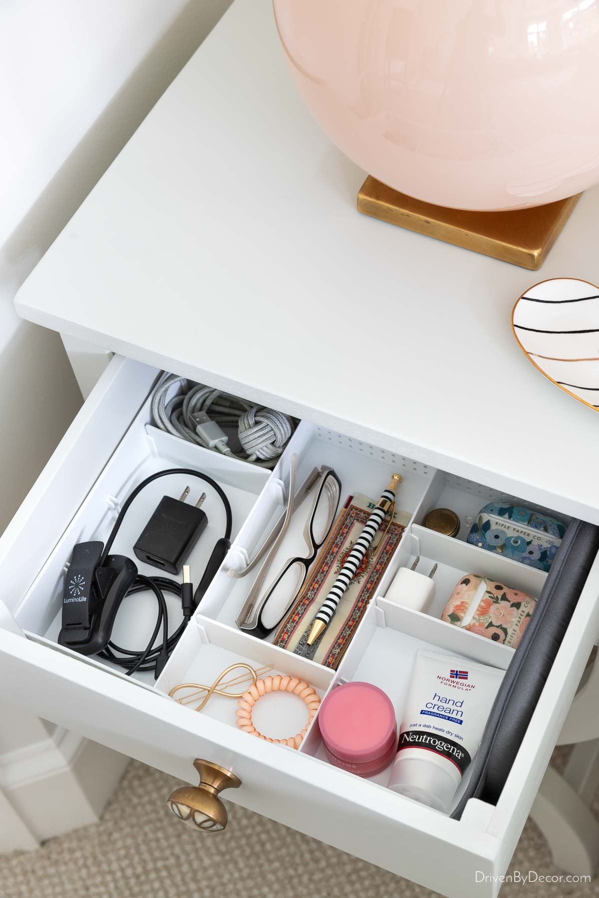 Shallow organizer tray in bedroom nightstand