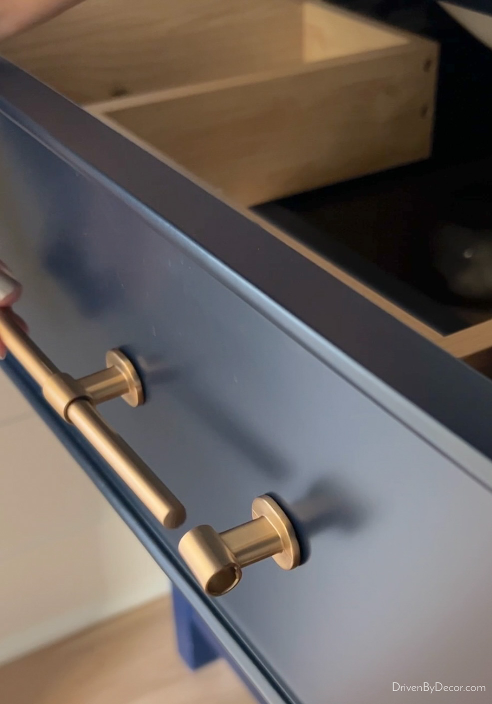 Sliding bar onto posts for adjustable cabinet pull for use when cabinet pull holes are slightly off