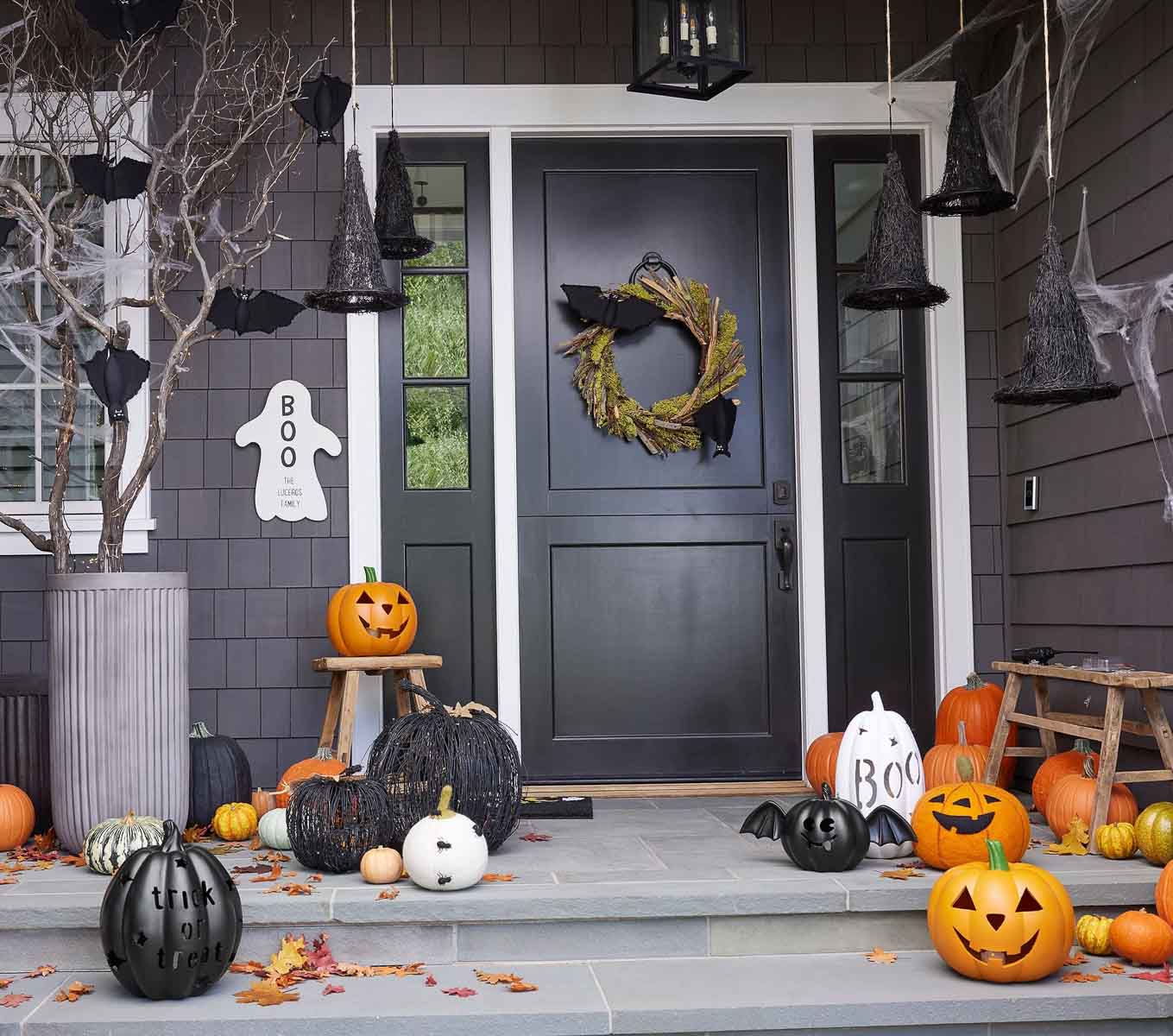 Floating witch hats on front porch for Halloween