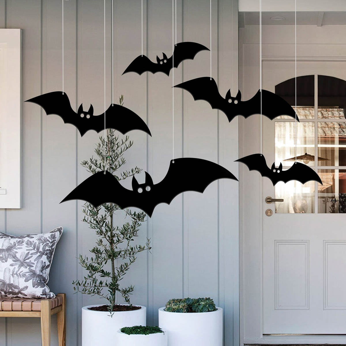 Hanging metal bats for front porch Halloween decor