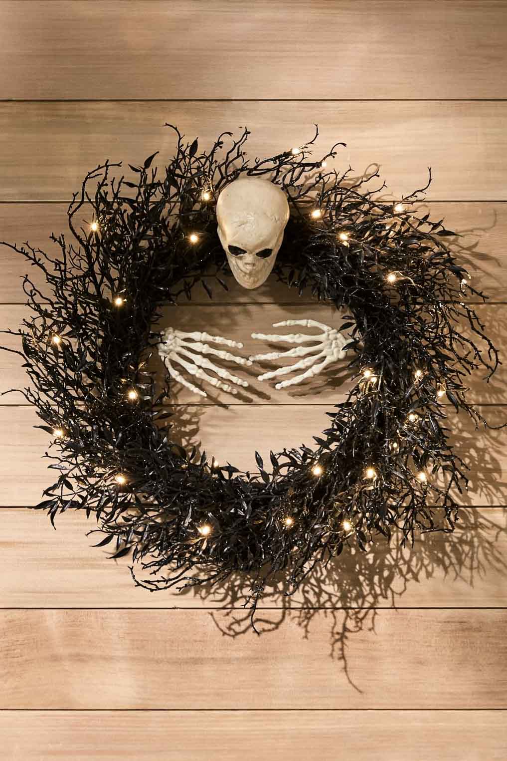 Spooky light-up skeleton wreath for front porch Halloween decor