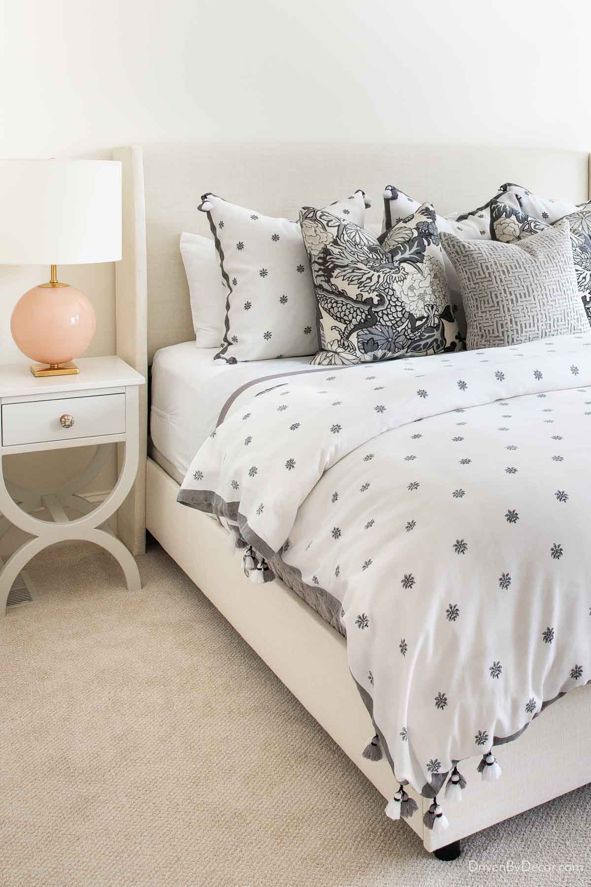 Bedroom nightstand and upholstered bed