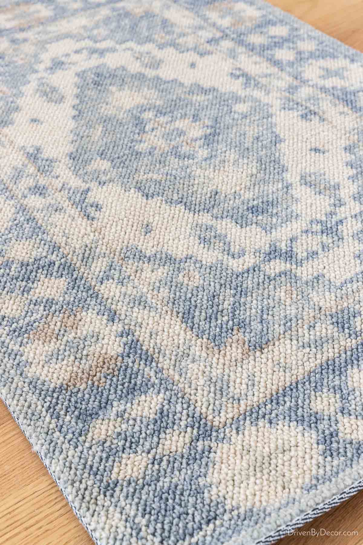 Oriental style rug with blues that are perfect for a living room