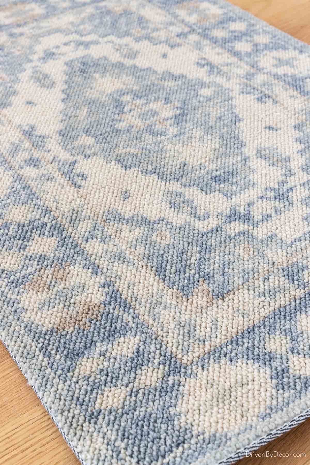 Oriental style rug with blues that are perfect for a living room