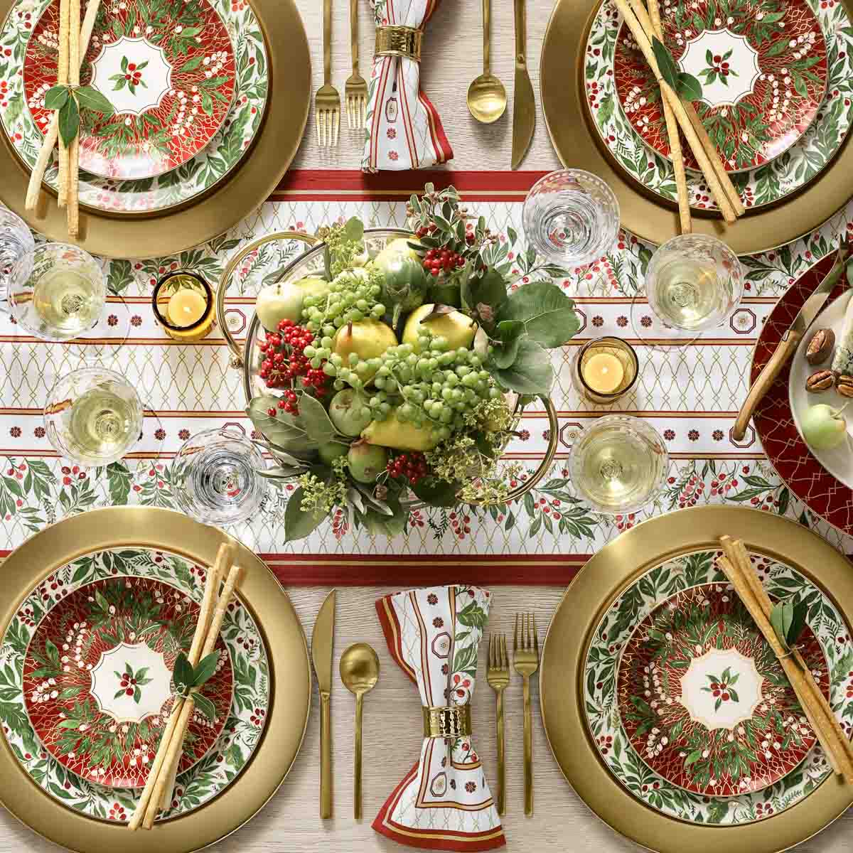 A Christmas table with fruit centerpiece