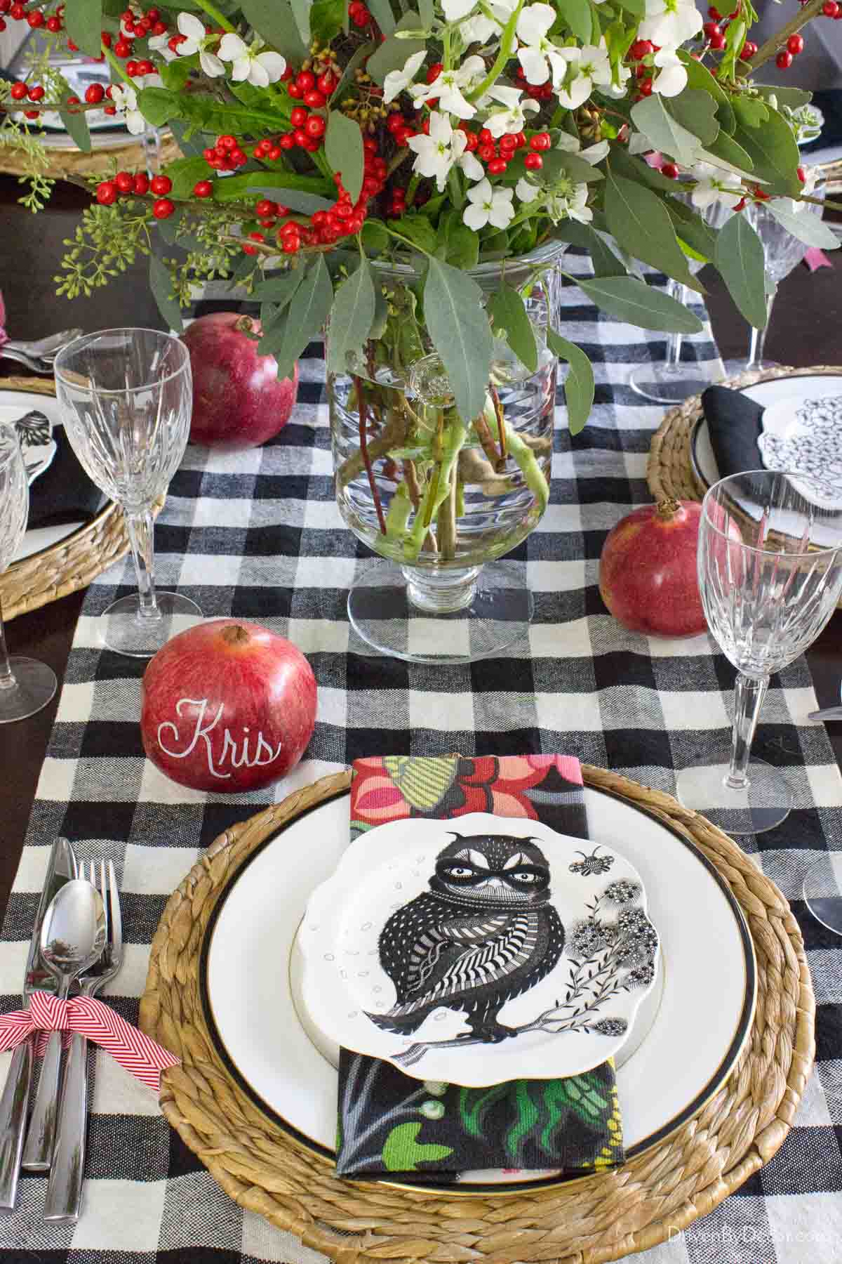 Pomegranate used as placecard for Christmas table decor