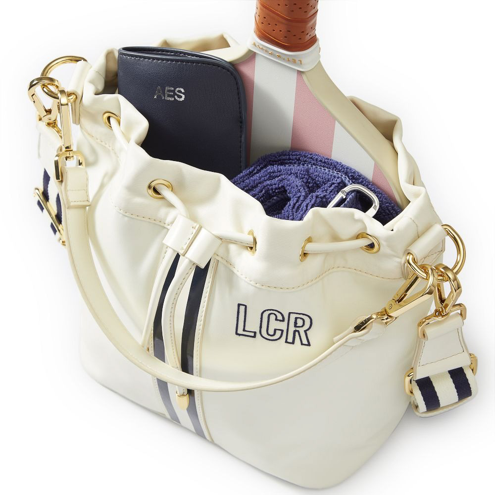 Pickleball tote with racket and other essentials inside