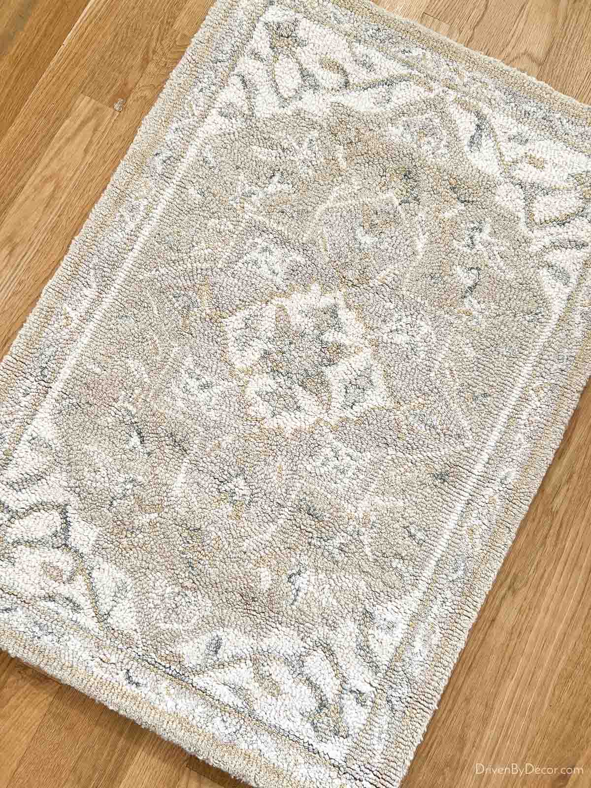 Neutral patterned area rug with gray and ivory colors