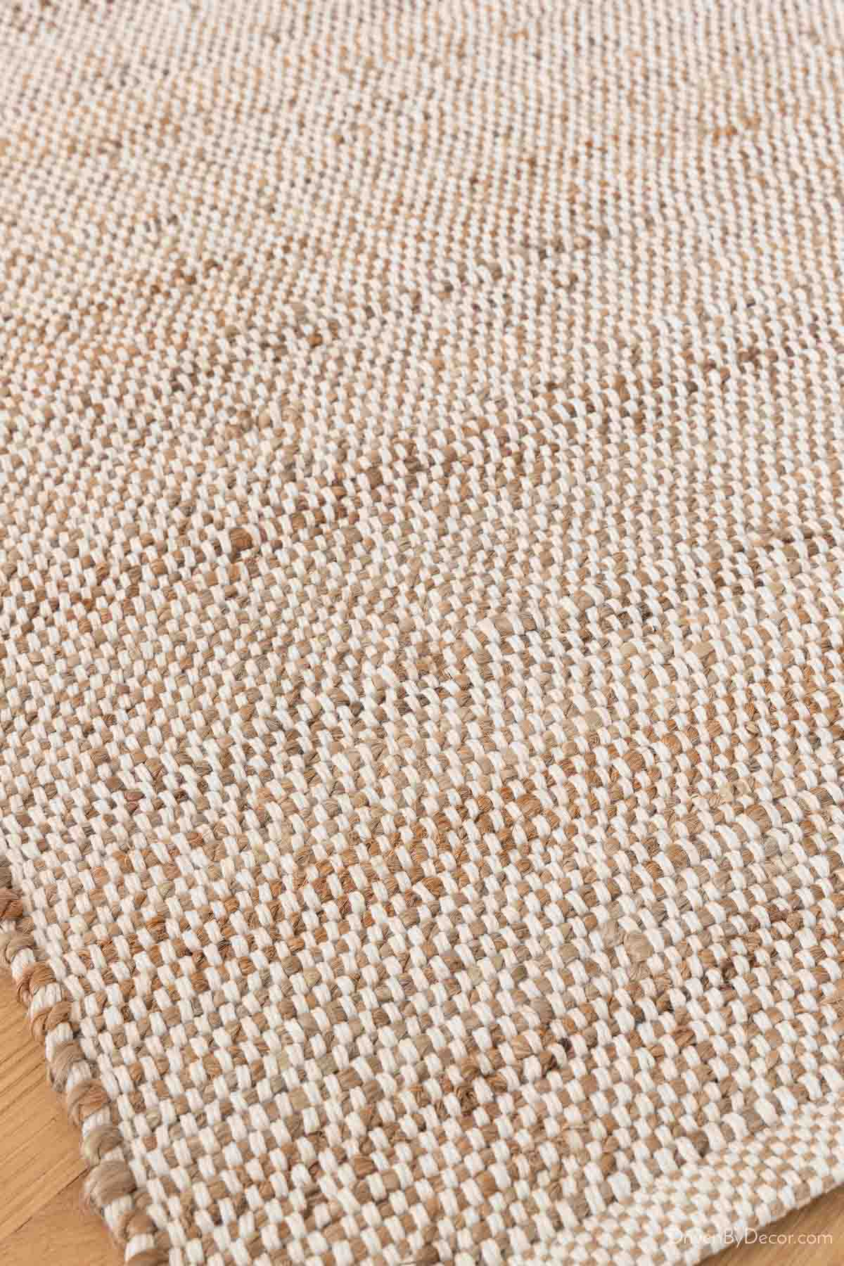 Thin neutral cotton/jute area rug