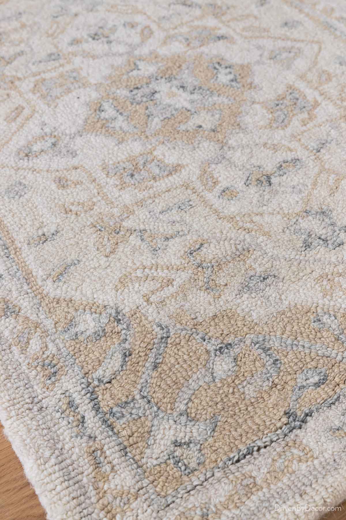 Patterned neutral rug with a modern Oushak vibe