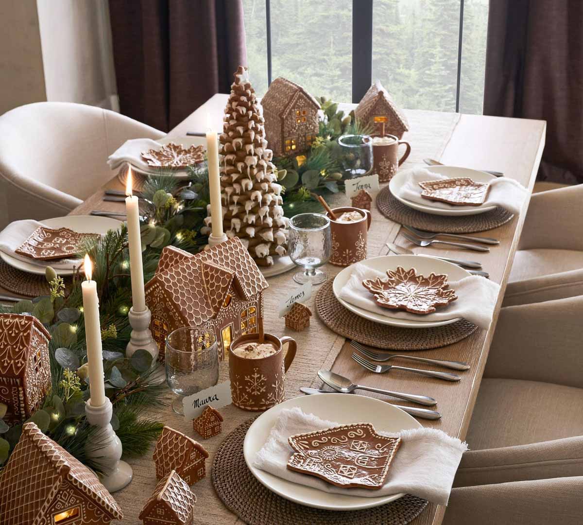 Gingerbread houses down middle of Christmas table