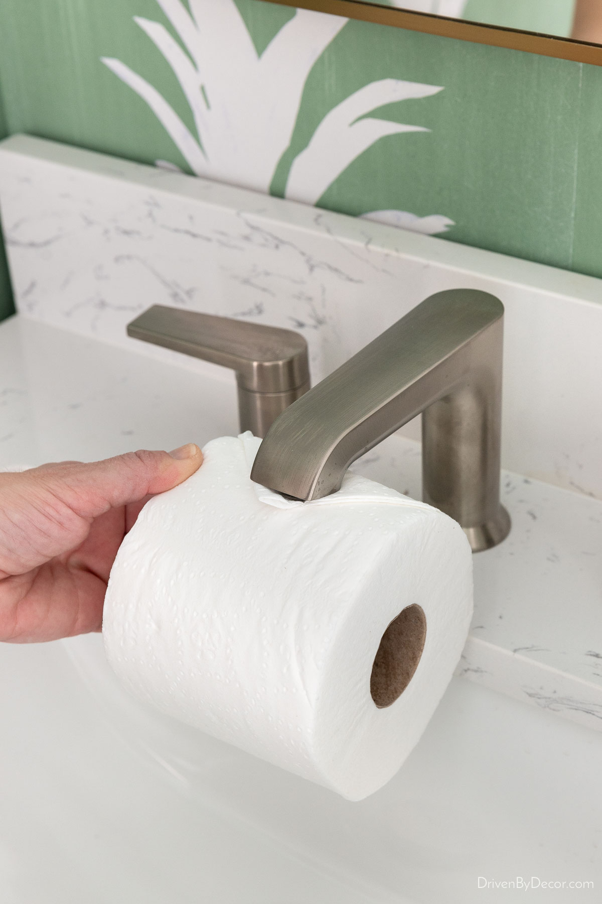 Sealing the end of the toilet paper roll with a faucet