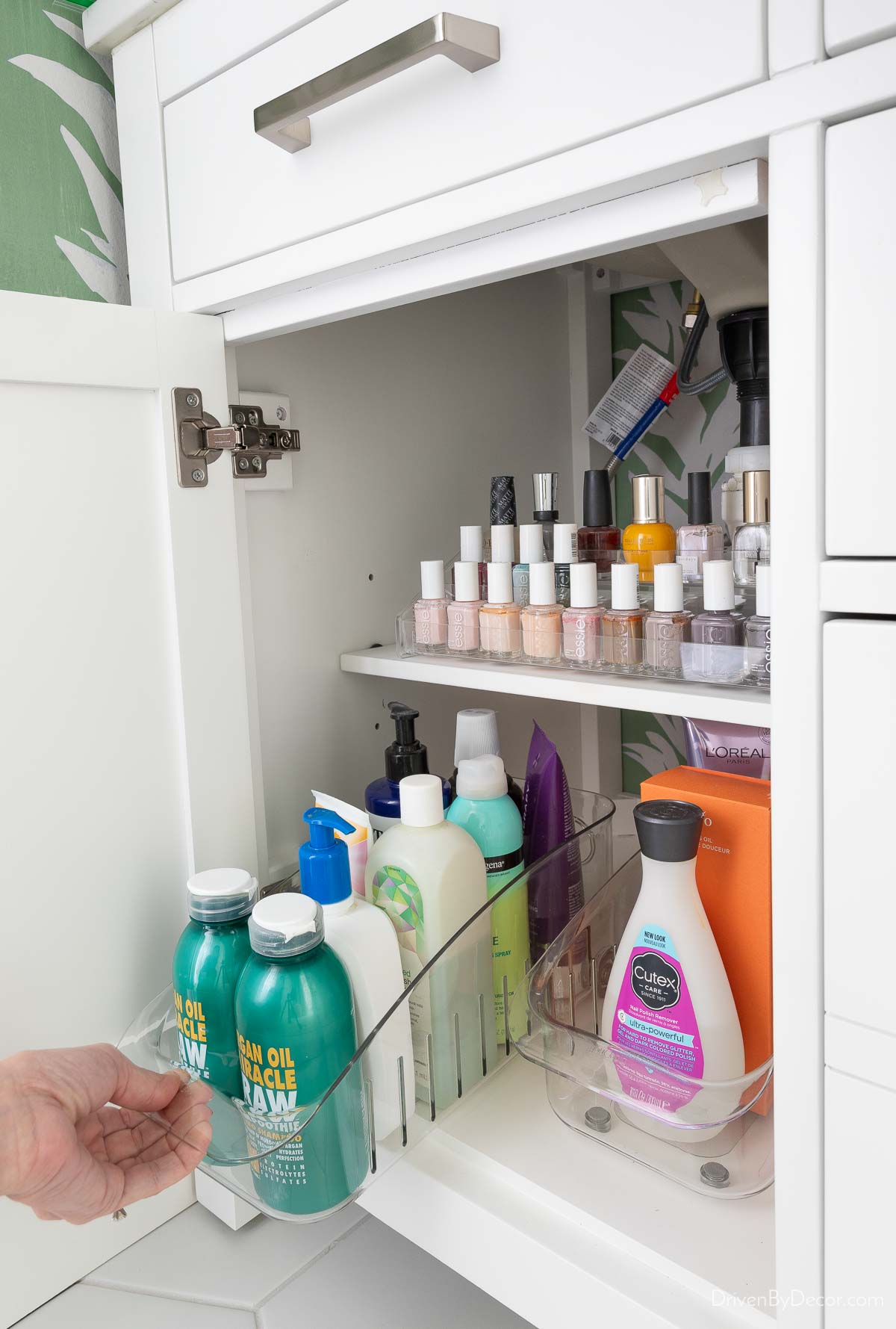 Storage space in cabinet on one side of double bathroom vanity