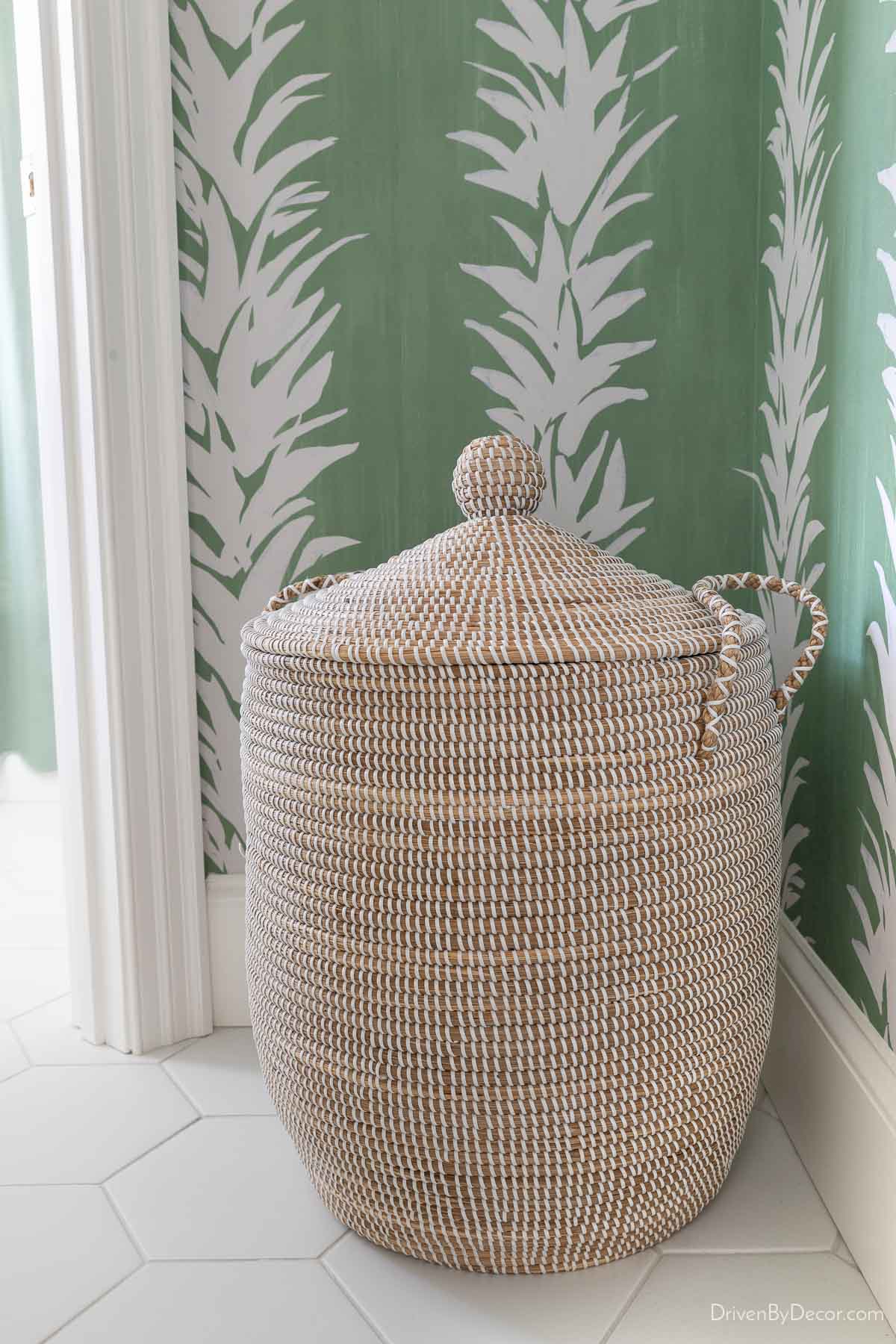 Lidded woven hamper in bathroom