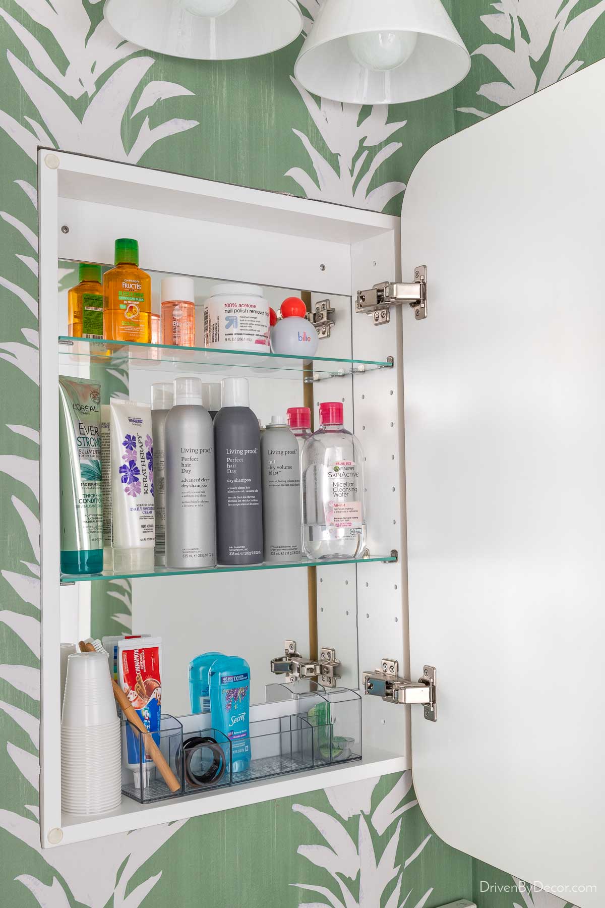 Storage of toiletries in medicine cabinet mirror