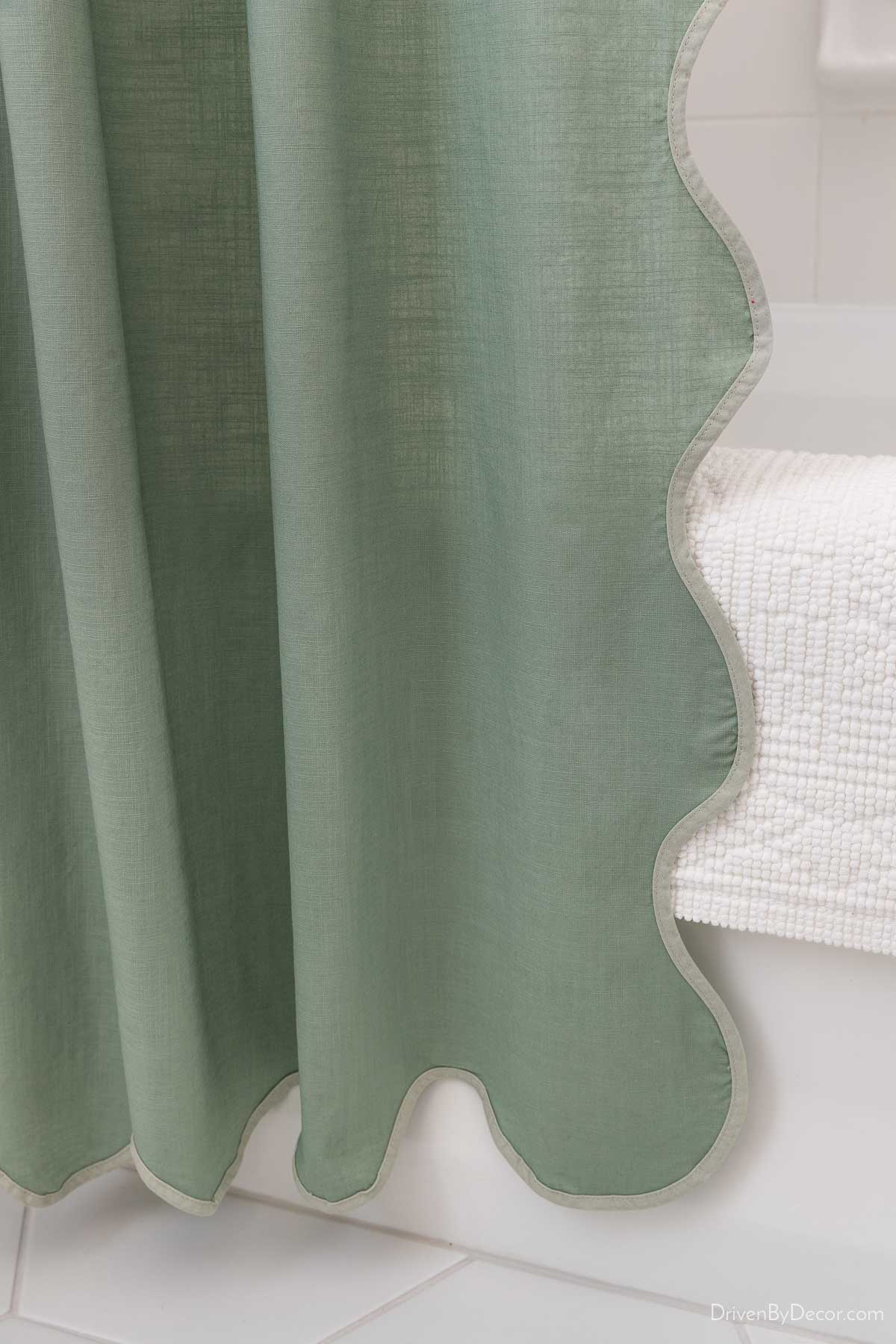 Scalloped green shower curtain