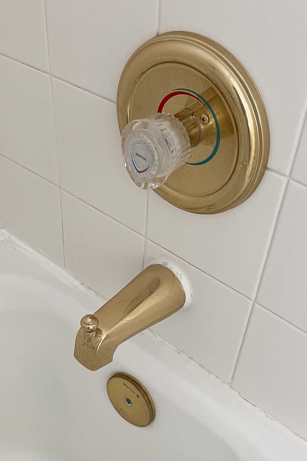 Dated tub/shower hardware